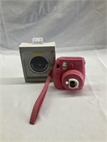 Instax camera with selfie light included