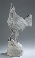Folk art metal sculpture of a rooster.