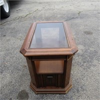 Wood glass top side table.