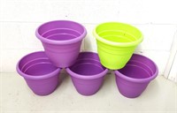 Five plastic plant pots purple green 11"