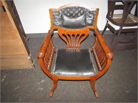 Nice antique leather and oak chair.
