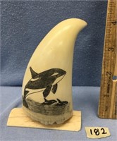 Approx. 4 1/2" tall whales tooth, scrimshawed on b