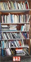 6 shelves books: Currier & Ives, Obama,