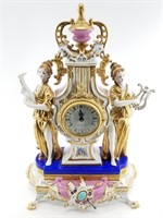 French porcelain and gold gilded mantle clock. I h