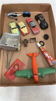Lot of vintage tin toys.  Some are missing wheels