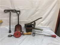 Group of vintage tools and kitchen utensil