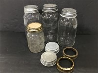Lot of assorted vintage jars and lids