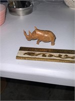 small rhinoceros carved wood card holder