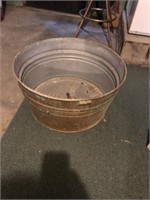Galvanized pail has hole in bottom