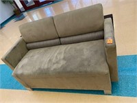 Tan plush love seat brown back support