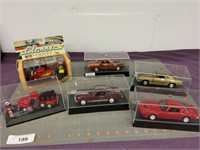 6 assorted cars, trucks, display cases
