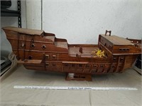 Large decorative wood boat has damaged please