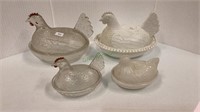 Lot of four nesting hen candy dishes - largest is