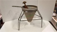 Vintage metal colander with mortar   1926