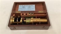 Antique student monocular brass microscope with