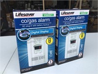 2 New Lifesaver co/gas alarm. AC plug-in with