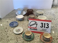 Mini Tea Sets and extra Saucers as Displayed