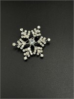 Cute little snowflake brooch