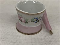 Miniature tea cup with umbrella for handle