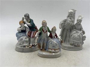 -3 colonial style couple figurines, one