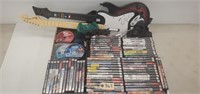 Playstation2 w/ (2) Guitars/Controllers, (67) Game