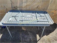 TWO COSCO FOLDING TABLES
