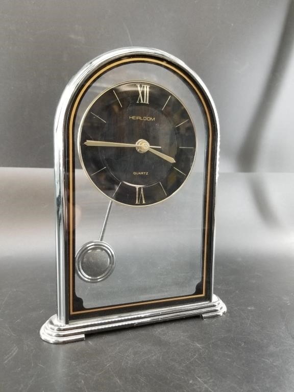 Heirloom quartz clock, with some art deco theme, 9