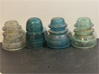 Four vintage Insulators