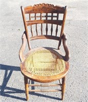 Antique carved back chair. Good condition.
