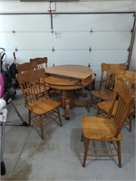 Hardwood table and six press back chairs