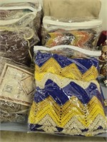 Lot of quilts, blankets, Afghans etc as shown