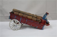 Cast iron wagon with wood barrels, 9 X 5.5"H