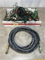 Extension outlets, air hose, and bungee cords