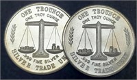 (2) 1 Troy Oz. Silver World Trade Rounds