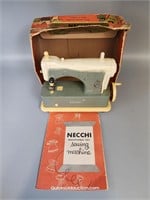 Mini Supernova Necchi Toy Sewing Machine & Booklet