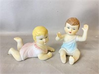Two Porcelain Baby Figurines