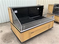 Hussmann refrigerated open case on casters