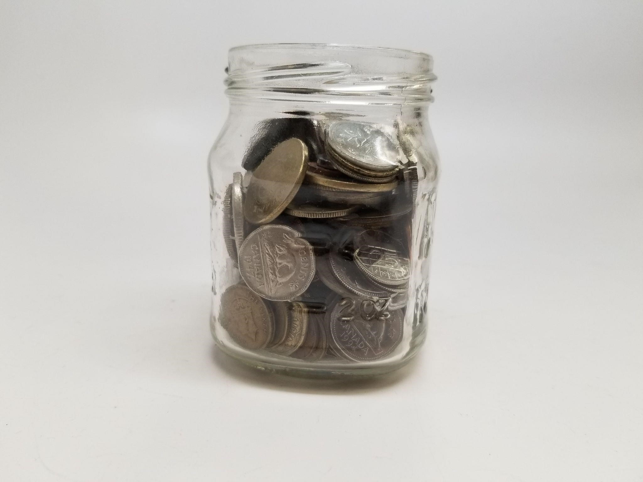 Jar Of Foreign Coins
