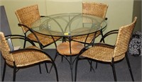 glasstop patio table and whicker chairs