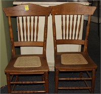 two 1920s caned tall back chairs