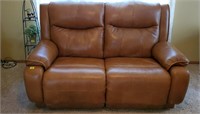 Leather reclining love seat