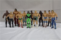 Twelve wrestling figures including Iron Sheik,