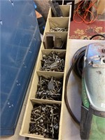 Plastic tray full of mostly screws of various