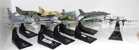 Nine various hand made model fighter aircraft