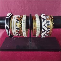 Group of Black, White and gold Colored Bangle