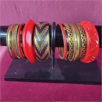 Group of Black, Red and gold Colored Bangle