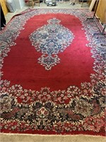 Large area rug 17 foot 4" x 11’ has some wear on