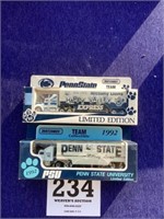 Two matchbox Penn State tractor trailers