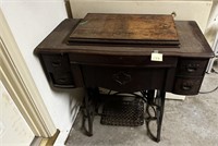 Old Sewing Machine In Cabinet