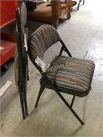 TWO FOLDING PADDED CHAIRS